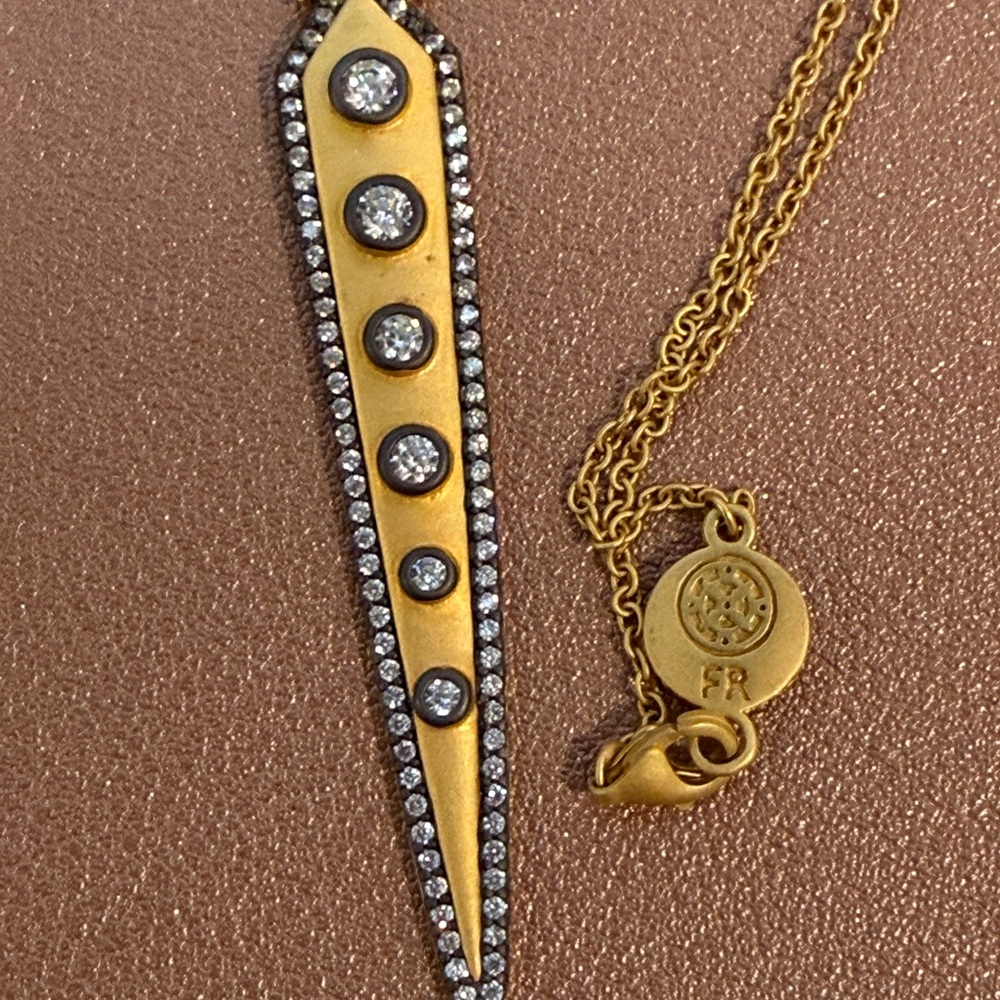 Freida Rothman dagger style pendant necklace, mixed metal. Industrial.
